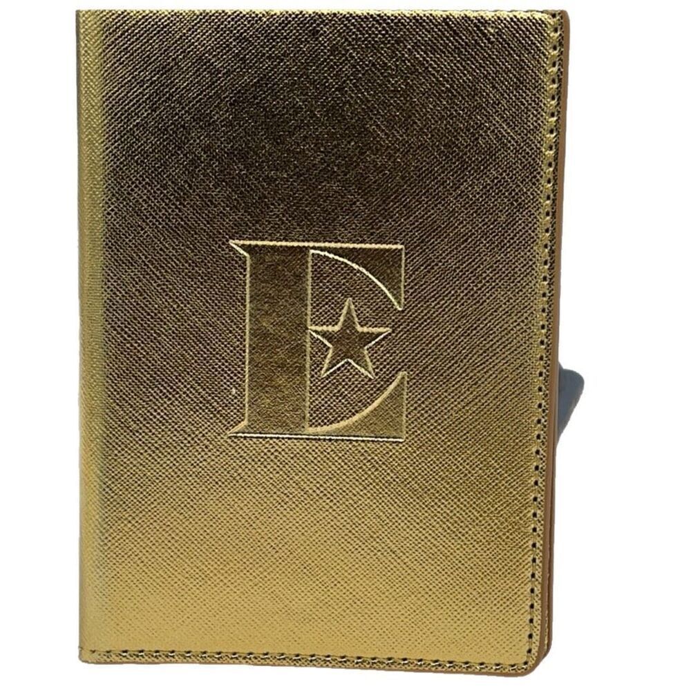 Vintage Elton John gold colored passport cover.